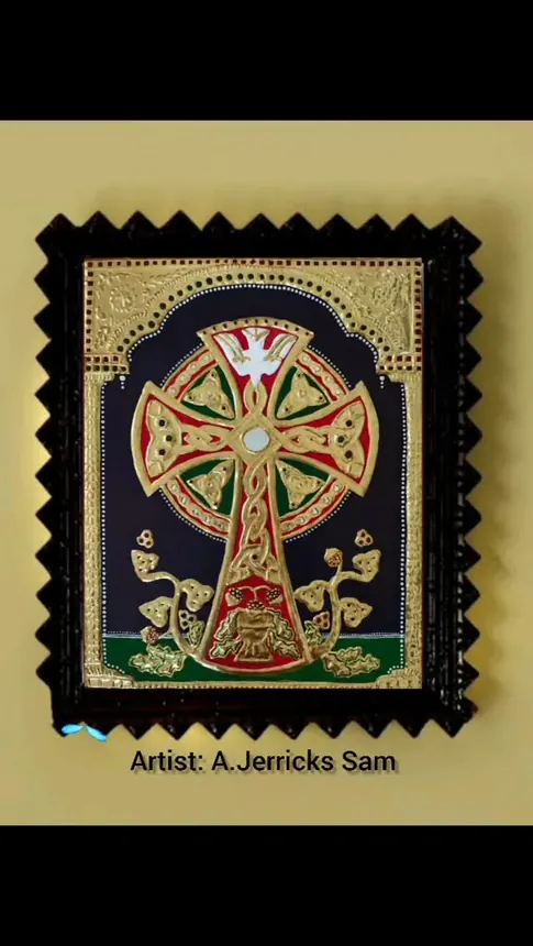 A richly ornamented cross depicted in a framed artwork.